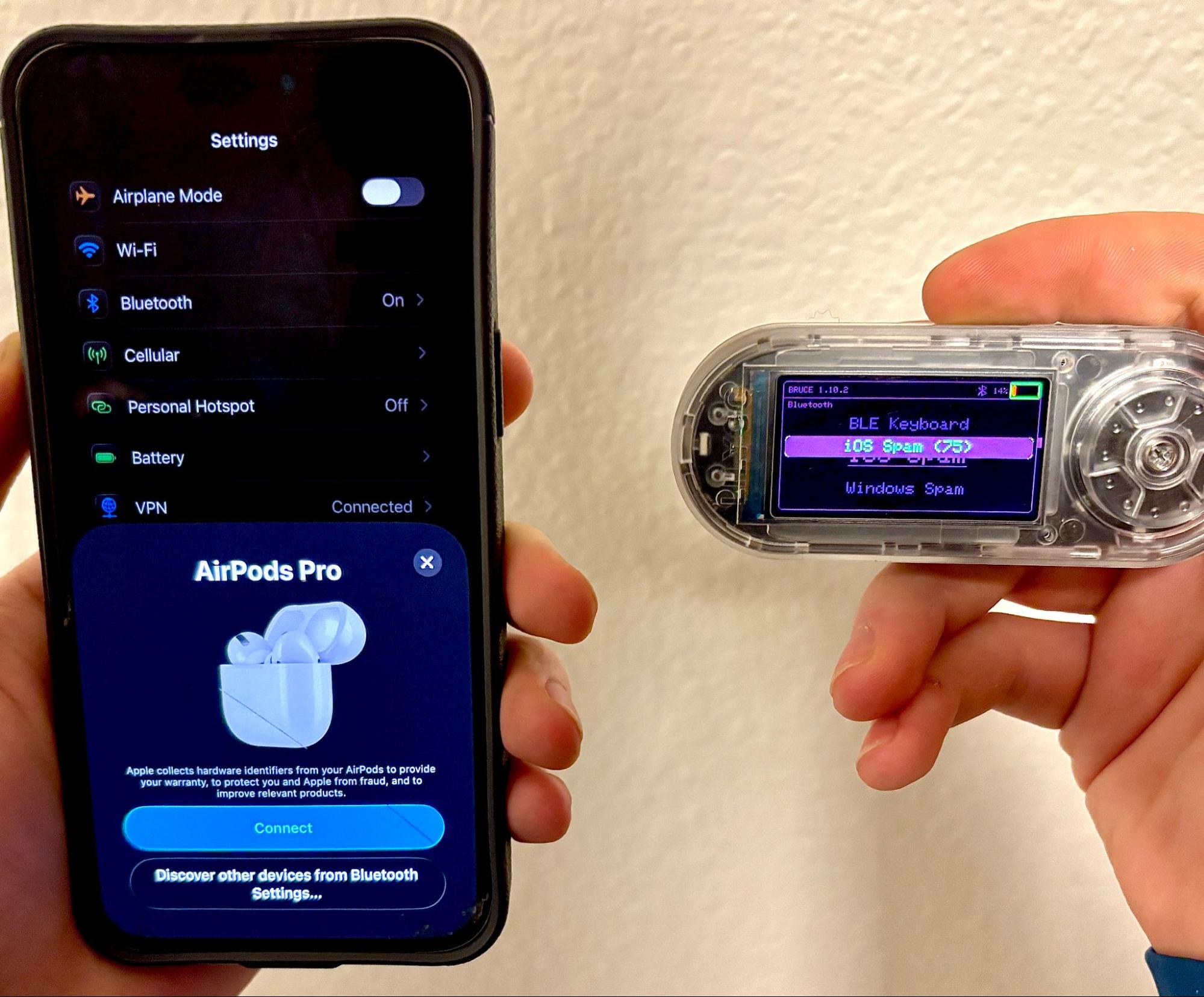 The LILYGO device running BLE spam, with a phone showing an AirPods pairing popup