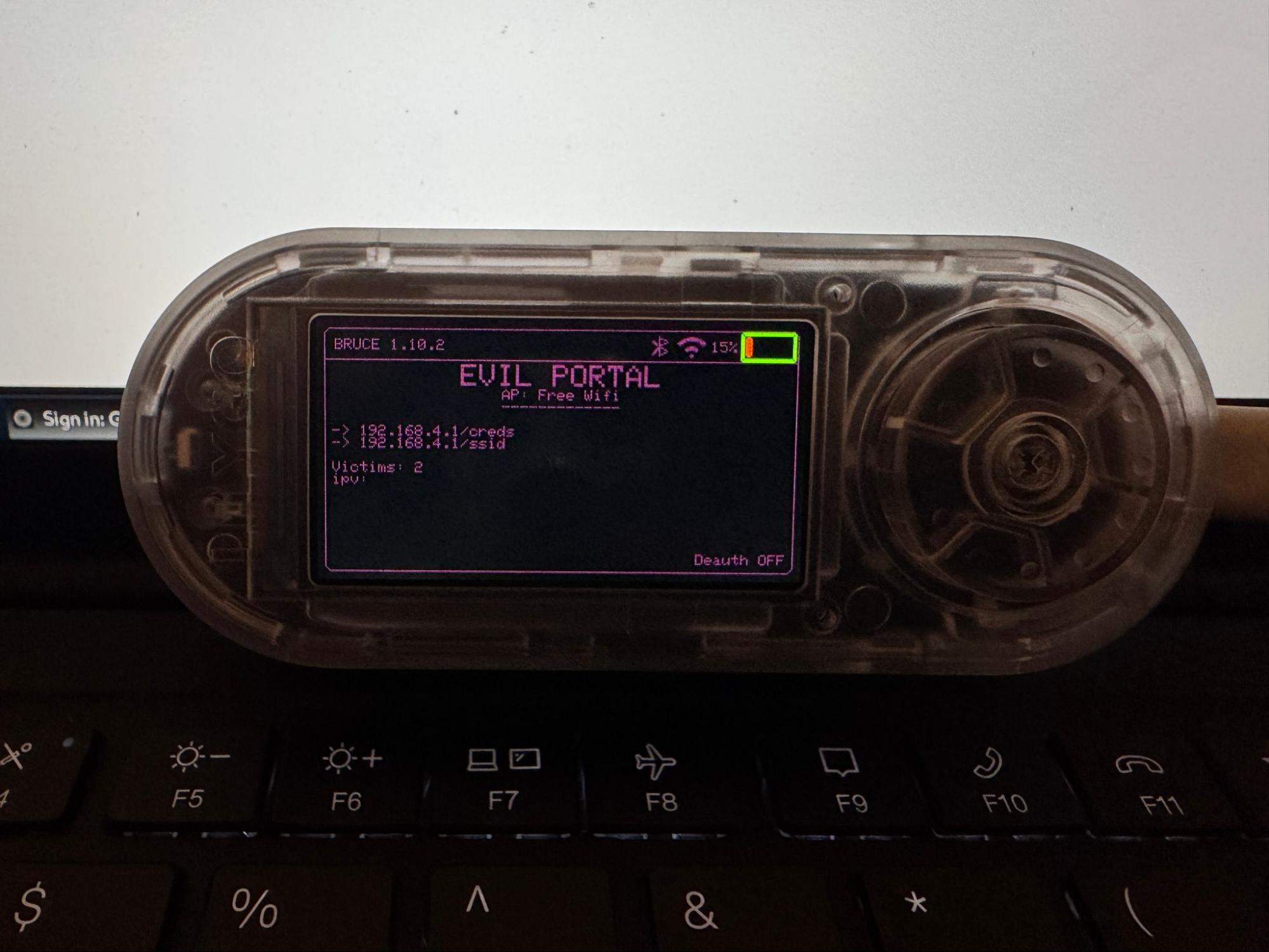 Close-up of the LILYGO device screen showing the Evil Portal module running